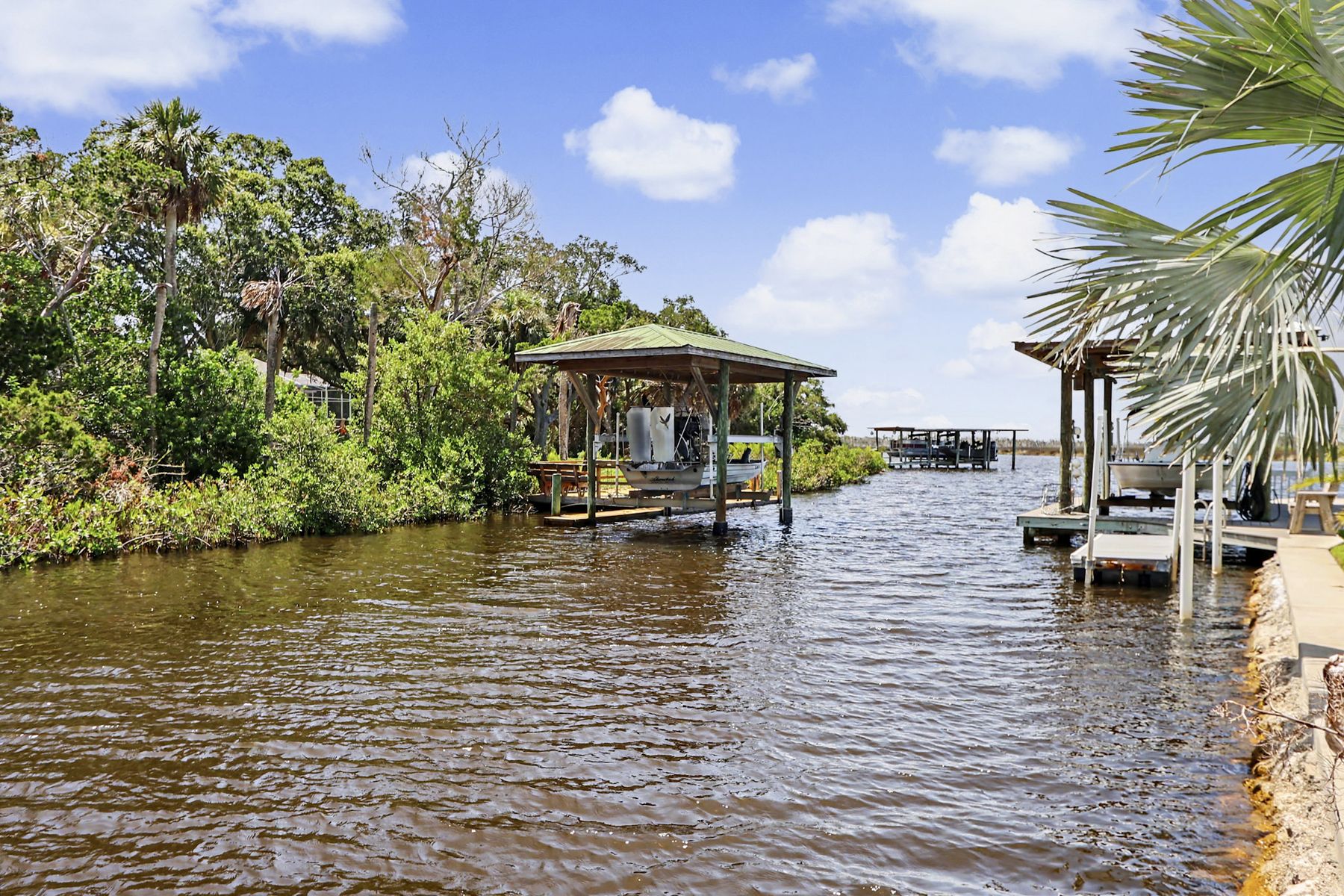 Looking back from the middle of the creek at The Rusty Hook Riverhouse, Old Homosassa, Florida