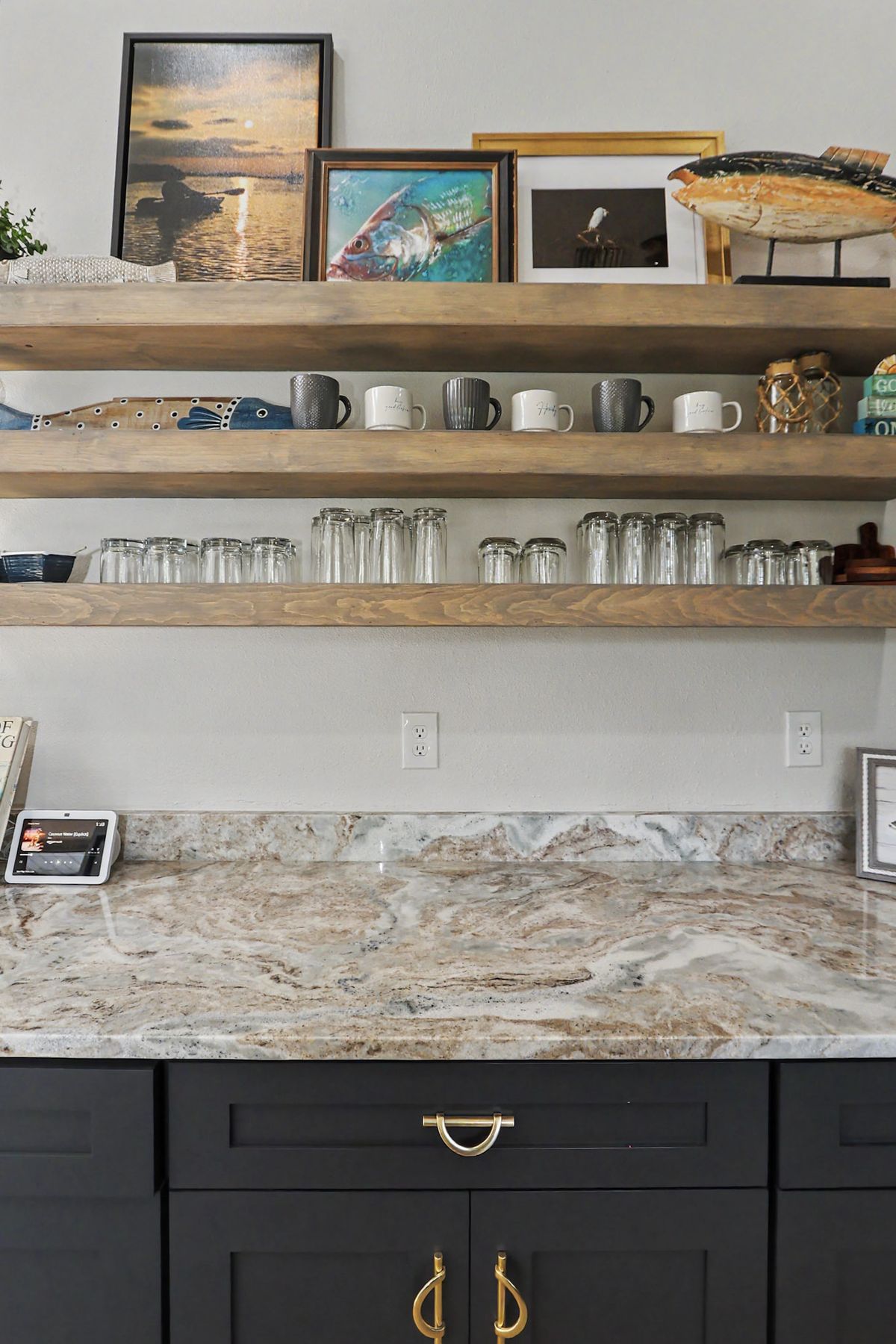 Open shelves above the counter at The Rusty Hook Riverhouse, Old Homosassa, Florida
