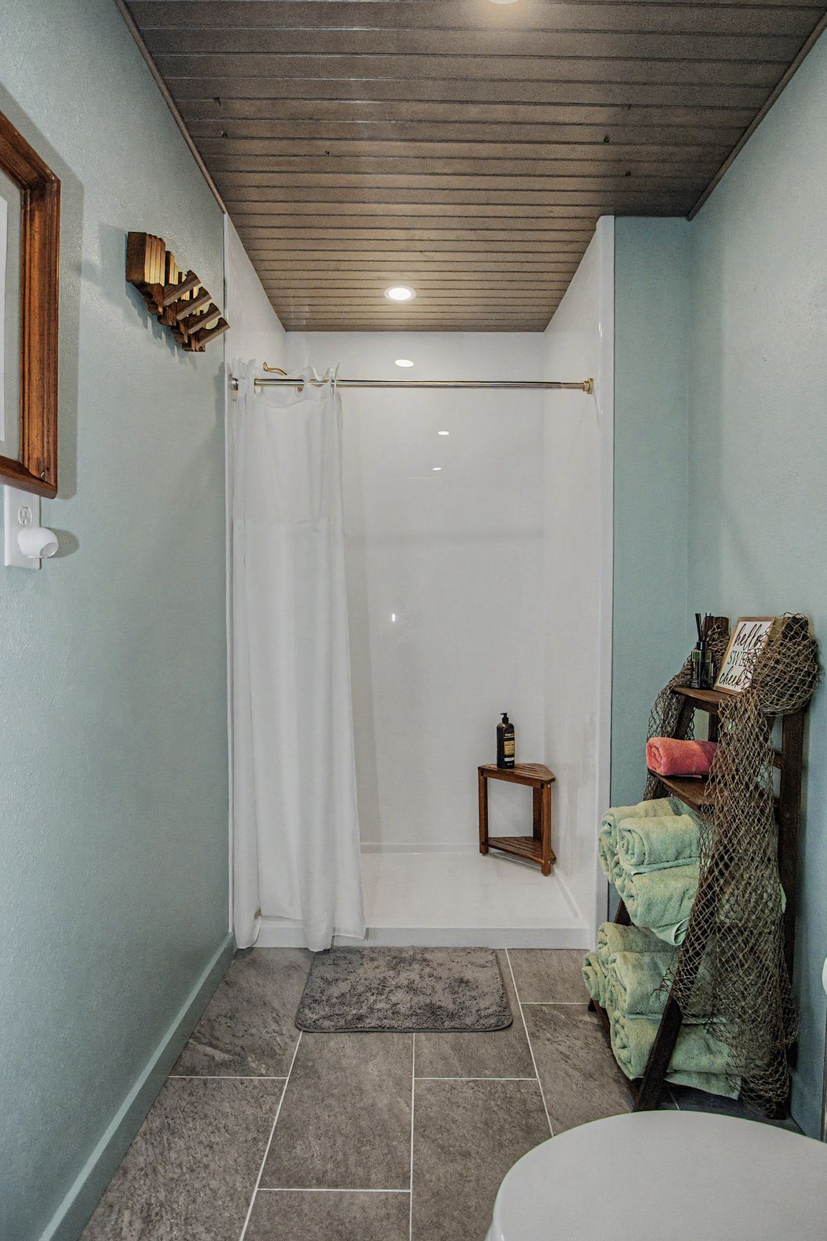 Walk-in shower downstairs at The Rusty Hook Riverhouse, Old Homosassa, Florida