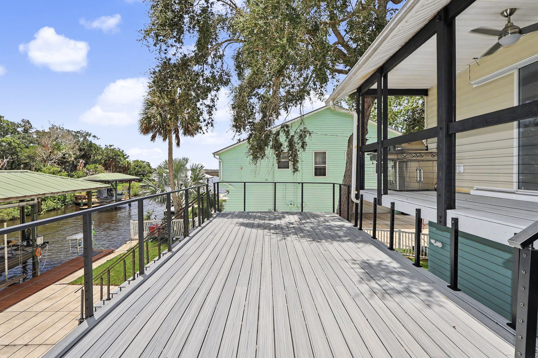 The deck at the water end at The Rusty Hook Riverhouse, Old Homosassa, Florida