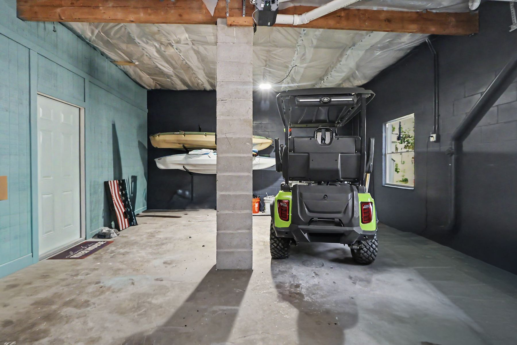 Covered storage and the kayak rack at The Rusty Hook Riverhouse, Old Homosassa, Florida