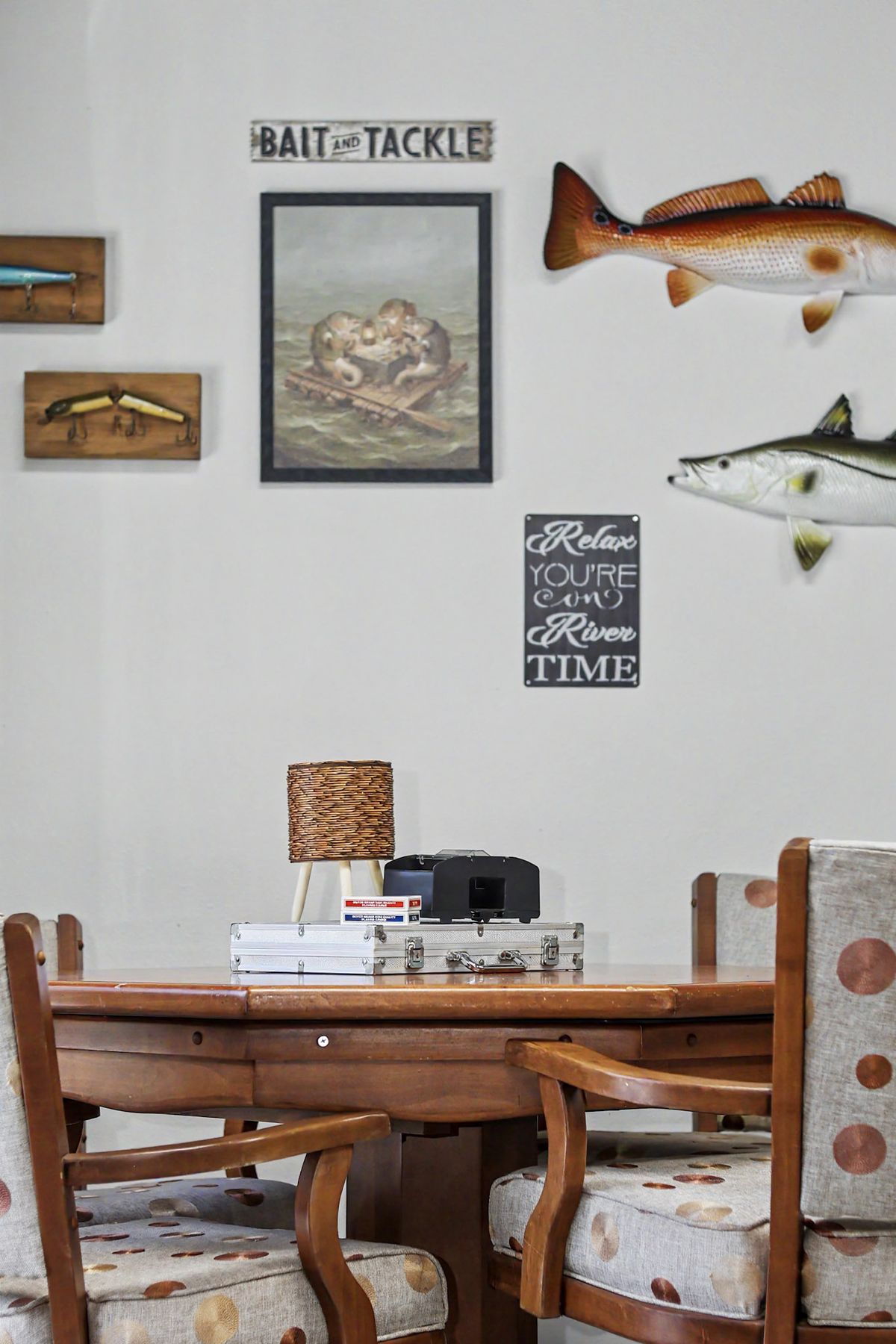 Bait and tackle prints on the wall at The Rusty Hook Riverhouse, Old Homosassa, Florida
