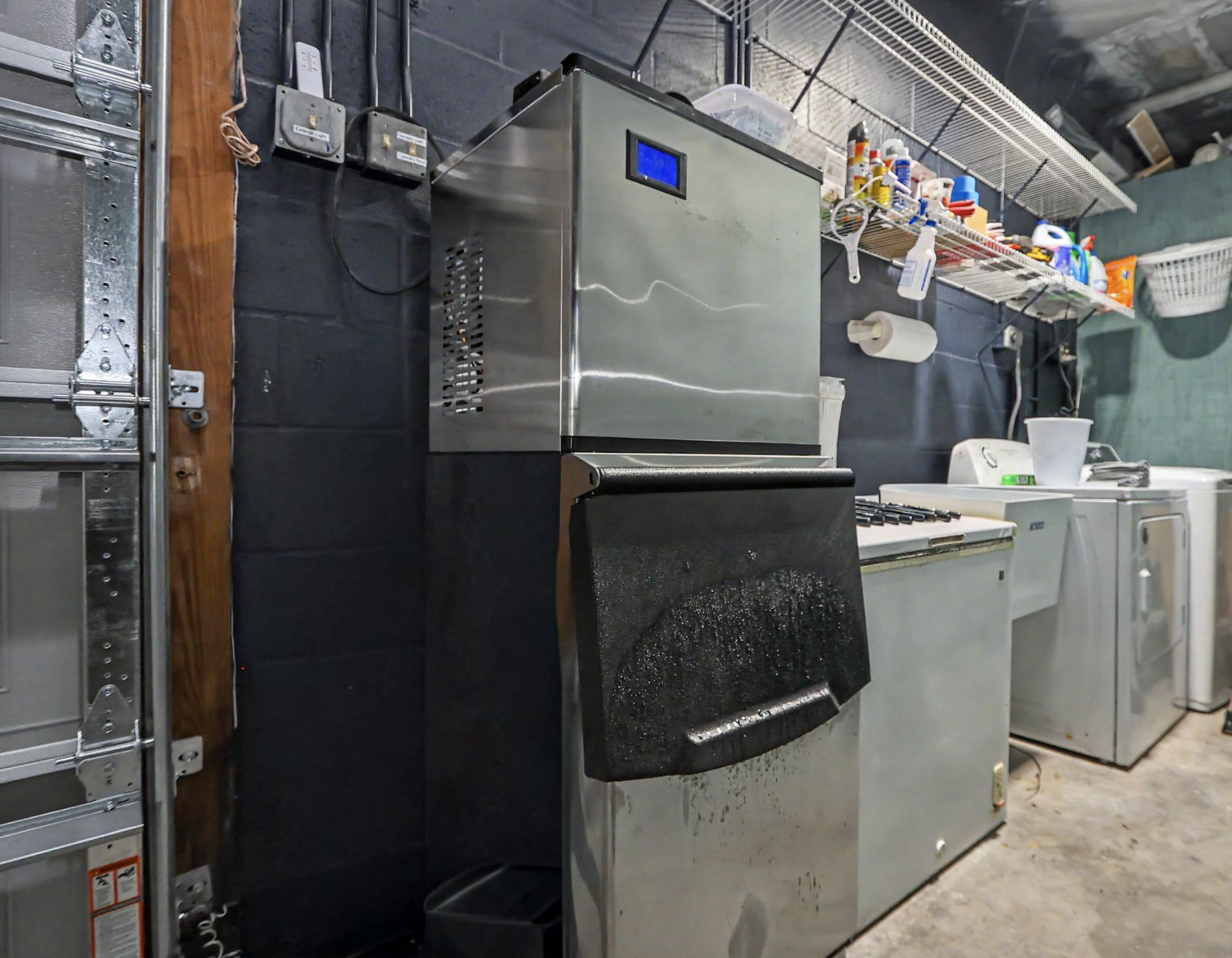Ice machine, laundry and cold storage downstairs at The Rusty Hook Riverhouse, Old Homosassa, Florida