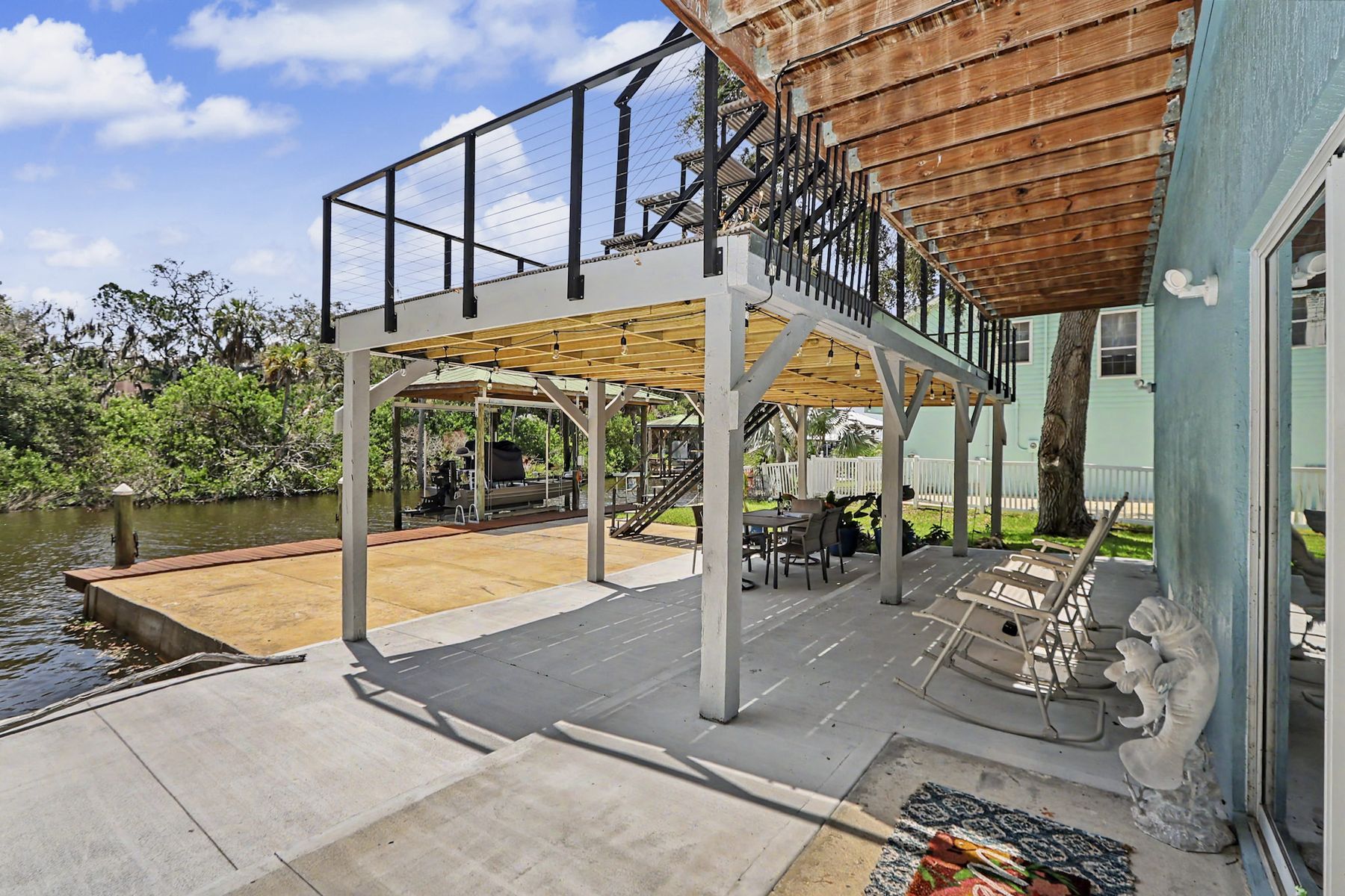 The shaded ground level under the house at The Rusty Hook Riverhouse, Old Homosassa, Florida