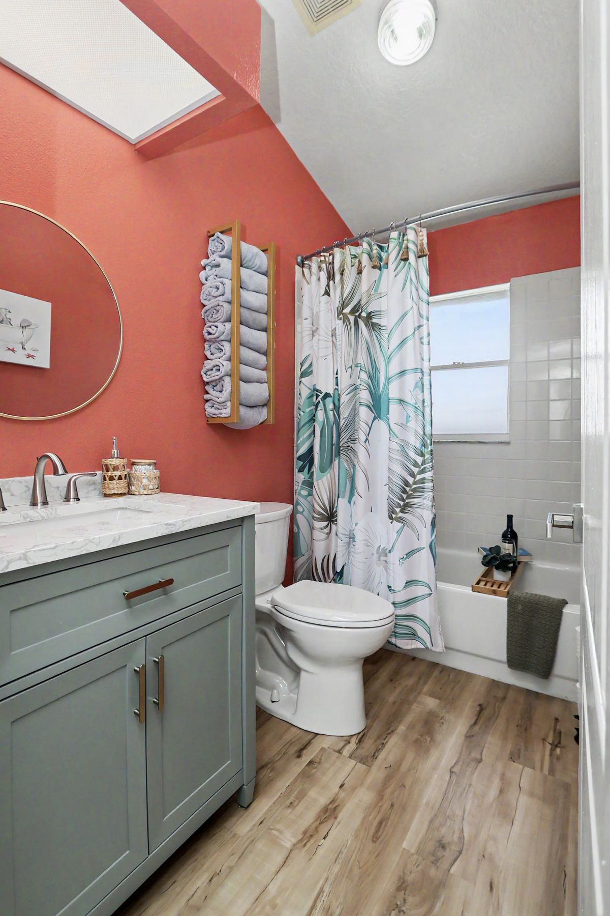 The coral bathroom from the hall at The Rusty Hook Riverhouse, Old Homosassa, Florida